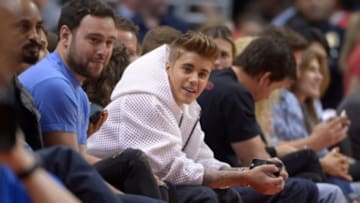 May 11, 2014; Los Angeles, CA, USA; Recording artist and entertainer Justin Bieber attends game four of the second round of the 2014 NBA Playoffs between the Oklahoma City Thunder and the Los Angeles Clippers at Staples Center. Mandatory Credit: Kirby Lee-USA TODAY Sports