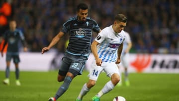 GENK, BELGIUM - APRIL 20: Leandro Trossard of Genk holds off Gustavo Cabral of Celta Vigo during the UEFA Europa League quarter final second leg between KRC Genk and Celta Vigo at Luminus Arena on April 20, 2017 in Genk, Belgium. (Photo by Dean Mouhtaropoulos/Getty Images)