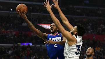 LOS ANGELES, CA - FEBRUARY 01: Kawhi Leonard #2 of the Los Angeles Clippers scores a basket against Karl-Anthony Towns #32 of the Minnesota Timberwolves during the first half at Staples Center on February 1, 2020 in Los Angeles, California. NOTE TO USER: User expressly acknowledges and agrees that, by downloading and/or using this Photograph, user is consenting to the terms and conditions of the Getty Images License Agreement. (Photo by Kevork Djansezian/Getty Images)