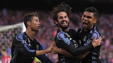 MADRID, SPAIN - MAY 10: Isco (C) of Real Madrid celebrates scoring his team's opening goal with Cristiano Ronaldo (L) and Casemiro during the UEFA Champions League Semi Final second leg match between Club Atletico de Madrid and Real Madrid CF at Vicente Calderon Stadium on May 10, 2017 in Madrid, Spain. (Photo by Laurence Griffiths/Getty Images)
