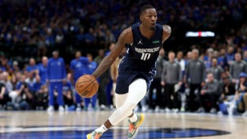 DALLAS, TEXAS - APRIL 16: Dorian Finney-Smith #10 of the Dallas Mavericks dribbles the ball against the Utah Jazz in the second quarter of Game One of the Western Conference First Round NBA Playoffs at American Airlines Center on April 16, 2022 in Dallas, Texas. NOTE TO USER: User expressly acknowledges and agrees that, by downloading and or using this photograph, User is consenting to the terms and conditions of the Getty Images License Agreement. (Photo by Tom Pennington/Getty Images)