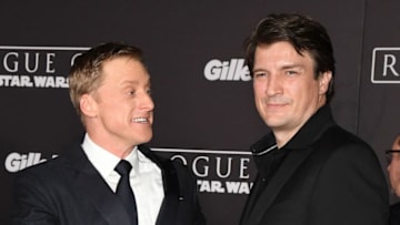 HOLLYWOOD, CA - DECEMBER 10: Actors Alan Tudyk (L) and Nathan Fillion attend the premiere of Walt Disney Pictures and Lucasfilm's "Rogue One: A Star Wars Story" at the Pantages Theatre on December 10, 2016 in Hollywood, California. (Photo by Ethan Miller/Getty Images)