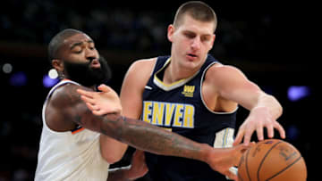 NEW YORK, NY - OCTOBER 30: Kyle O'Quinn #9 of the New York Knicks and Nikola Jokic #15 of the Denver Nuggets battle for the ball in the second quarter during their game at Madison Square Garden on October 30, 2017 in New York City. (Photo by Abbie Parr/Getty Images)