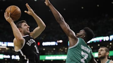 Oct 26, 2016; Boston, MA, USA; Brooklyn Nets guard Joe Harris (12) shoots against Boston Celtics forward Jaylen Brown (7) in the second half at TD Garden. The Celtics defeated the Brooklyn Nets 122-117. Mandatory Credit: David Butler II-USA TODAY Sports
