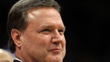 LAWRENCE, KS - FEBRUARY 26: Bill Self head coach of the Kansas Jayhawks smiles as he watches members of his senior class being introduced prior to a game Texas Longhorns at Allen Fieldhouse on February 26, 2018 in Lawrence, Kansas. (Photo by Ed Zurga/Getty Images)