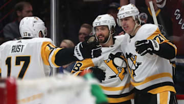 Bryan Rust #17, Kris Letang #58 and Evgeni Malkin #71 of the Pittsburgh Penguins. (Photo by Matthew Stockman/Getty Images)