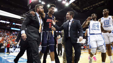 KANSAS CITY, MISSOURI - MARCH 29: Chuma Okeke #5 of the Auburn Tigers is helped off the court after suffering an injury against the North Carolina Tar Heels during the 2019 NCAA Basketball Tournament Midwest Regional at Sprint Center on March 29, 2019 in Kansas City, Missouri. (Photo by Jamie Squire/Getty Images)