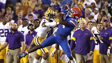 BATON ROUGE, LOUISIANA - OCTOBER 12: Kyle Pitts #84 of the Florida Gators catches a pass as Grant Delpit #7 of the LSU Tigers defends at Tiger Stadium on October 12, 2019 in Baton Rouge, Louisiana. (Photo by Marianna Massey/Getty Images)