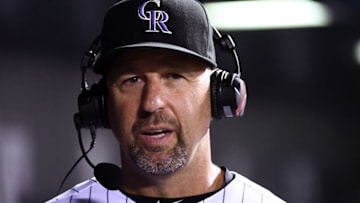 Sep 6, 2016; Denver, CO, USA; Colorado Rockies manager Walt Weiss (22) is interviewed in the fifth inning against the San Francisco Giants at Coors Field. The Giants defeated the Rockies 3-2. Mandatory Credit: Ron Chenoy-USA TODAY Sports