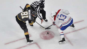 LAS VEGAS, NEVADA - OCTOBER 31: Jonathan Marchessault #81 of the Vegas Golden Knights faces off with Max Domi #13 of the Montreal Canadiens during the second period at T-Mobile Arena on October 31, 2019 in Las Vegas, Nevada. (Photo by David Becker/NHLI via Getty Images)