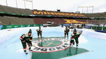 MINNEAPOLIS, MN - FEBRUARY 20: (L-R) Ryan Carter #18, Mike Reilly #4, Nate Prosser #39 and Matt Dumba #24 of the Minnesota Wild stand in position at an auxiliary rink during practice for the 2016 Coors Light Stadium Series game between the Chicago Blackhawks and the Minnesota Wild at TCF Bank Stadium on February 20, 2016 in Minneapolis, Minnesota. (Photo by Dave Sandford/NHLI via Getty Images)
