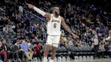 DETROIT, MICHIGAN - DECEMBER 11: LeBron James #6 of the Los Angeles Lakers reacts against the Detroit Pistons during the third quarter at Little Caesars Arena on December 11, 2022 in Detroit, Michigan. NOTE TO USER: User expressly acknowledges and agrees that, by downloading and or using this photograph, User is consenting to the terms and conditions of the Getty Images License Agreement. (Photo by Nic Antaya/Getty Images)