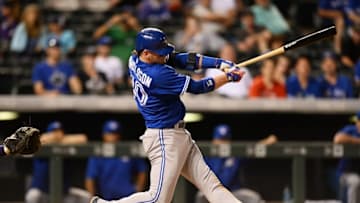 Jun 28, 2016; Denver, CO, USA; Toronto Blue Jays third baseman Josh Donaldson (20) singles in the seventh inning against the Colorado Rockies at Coors Field. The Blue Jays defeated the Rockies 14-9. Mandatory Credit: Ron Chenoy-USA TODAY Sports