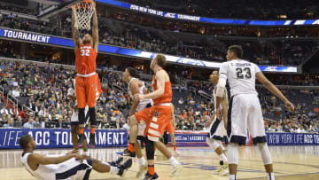 Mar 9, 2016; Washington, DC, USA; Syracuse Orange guard Malachi Richardson (23) dunks over a Pittsburgh Panthers defender in the first half during day two of the ACC conference tournament at Verizon Center. Mandatory Credit: Tommy Gilligan-USA TODAY Sports