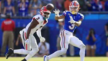 Florida Gators wide receiver Eugene Wilson III (3) hauls in a reception against Georgia Bulldogs defensive back Kamari Lassiter (3) during the first quarter of an NCAA Football game Saturday, Oct. 28, 2023 at EverBank Stadium in Jacksonville, Fla. [Corey Perrine/Florida Times-Union]