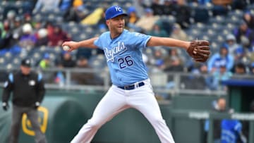 KANSAS CITY, MISSOURI - MARCH 30: Brad Boxberger #26 of the Kansas City Royals throws in seventh inning against the Chicago White Sox at Kauffman Stadium on March 30, 2019 in Kansas City, Missouri. (Photo by Ed Zurga/Getty Images)