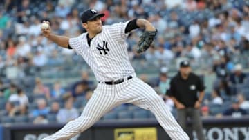 Jul 19, 2016; Bronx, NY, USA; New York Yankees starting pitcher Nathan Eovaldi (30) pitches during the first inning against the Baltimore Orioles at Yankee Stadium. Mandatory Credit: Anthony Gruppuso-USA TODAY Sports