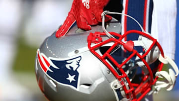 Jan 24, 2016; Denver, CO, USA; Detailed view of a New England Patriots helmet in the hand of a player against the Denver Broncos in the AFC Championship football game at Sports Authority Field at Mile High. Mandatory Credit: Mark J. Rebilas-USA TODAY Sports