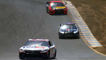 SONOMA, CALIFORNIA - JUNE 21: Denny Hamlin, driver of the #11 FedEx Ground Toyota, leads Kevin Harvick, driver of the #4 Mobil 1 Ford, and Martin Truex Jr., driver of the #19 Bass Pro Shops Toyota, during practice for the Monster Energy NASCAR Cup Series Toyota/Save Mart 350 at Sonoma Raceway on June 21, 2019 in Sonoma, California. (Photo by Jonathan Ferrey/Getty Images)
