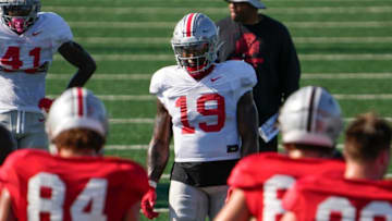 Aug 11, 2022; Columbus, OH, USA; Ohio State Buckeyes linebacker Chip Trayanum (19) lines up during football camp at the Woody Hayes Athletic Center. Mandatory Credit: Adam Cairns-The Columbus DispatchOhio State Football Camp