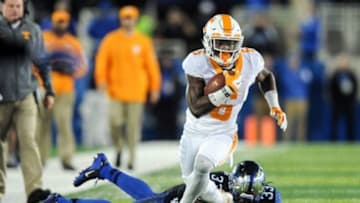 Oct 31, 2015; Lexington, KY, USA; Tennessee Volunteers running back Alvin Kamara (6) breaks a tackle against the Kentucky Wildcats. Mandatory Credit: Bryan Lynn-USA TODAY Sports