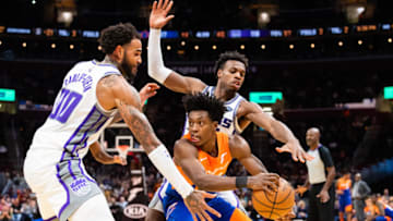 CLEVELAND, OH - DECEMBER 7: Willie Cauley-Stein #00 and Buddy Hield #24 of the Sacramento Kings double team Collin Sexton #2 of the Cleveland Cavaliers during the second half at Quicken Loans Arena on December 7, 2018 in Cleveland, Ohio. The Kings defeated the Cavaliers 129-110. NOTE TO USER: User expressly acknowledges and agrees that, by downloading and/or using this photograph, user is consenting to the terms and conditions of the Getty Images License Agreement. (Photo by Jason Miller/Getty Images)