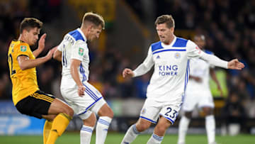 WOLVERHAMPTON, ENGLAND - SEPTEMBER 25: Marc Albrighton of Leicester City is challenged by Leander Dendoncker of Wolverhampton Wanderers during the Carabao Cup Third Round match between Wolverhampton Wanderers and Leicester City at Molineux on September 25, 2018 in Wolverhampton, England. (Photo by Michael Regan/Getty Images)