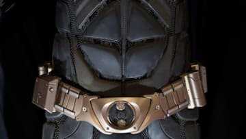LONDON, ENGLAND - SEPTEMBER 14: BatmanÕs Batsuit from The Dark Knight Rises (2012) estimated at £40k-£60k goes on display ahead of the Prop Store Rare Film and TV Memorabilia auction at BFI IMAX on September 14, 2016 in London, England. (Photo by John Phillips/Getty Images)