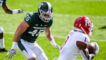 Michigan State's Noah Harvey closes in on Rutgers' Isaih Pacheco, right, during the second quarter on Saturday, Oct. 24, 2020, at Spartan Stadium in East Lansing.201024 Msu Rutgers 132a