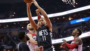 Dec 30, 2016; Washington, DC, USA; Brooklyn Nets center Brook Lopez (11) and Washington Wizards center Marcin Gortat (13) battle for a rebound in the first quarter at Verizon Center. Mandatory Credit: Geoff Burke-USA TODAY Sports