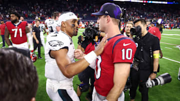 Nov 3, 2022; Houston, Texas, USA; Philadelphia Eagles quarterback Jalen Hurts (1) talks with Houston Texans quarterback Davis Mills (10) after the game at NRG Stadium. Mandatory Credit: Troy Taormina-USA TODAY Sports