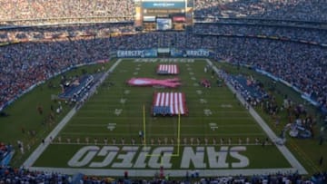 Oct 15, 2012; San Diego, CA, USA; General view of Qualcomm Stadium with a United States flag on the field and pink ribbons in honor of breast cancer awareness month during the playing of the national anthem before the NFL game between the Denver Broncos and the San Diego Chargers. Mandatory Credit: Kirby Lee/Image of Sport-USA TODAY Sports