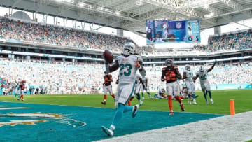 Sep 25, 2016; Miami Gardens, FL, USA; Miami Dolphins running back Jay Ajayi (23) celebrates his game winning touchdown in overtime against the Cleveland Browns at Hard Rock Stadium. Mandatory Credit: Steve Mitchell-USA TODAY Sports