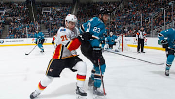 SAN JOSE, CA - MARCH 24: Garnet Hathaway #21 of the Calgary Flames skates against Barclay Goodrow #23 of the San Jose Sharks at SAP Center on March 24, 2018 in San Jose, California. (Photo by Rocky W. Widner/NHL/Getty Images) *** Local Caption *** Garnet Hathaway; Barclay Goodrow