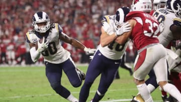 GLENDALE, AZ - DECEMBER 03: Running back Todd Gurley #30 of the Los Angeles Rams rushes the football against the Arizona Cardinals during the NFL game at the University of Phoenix Stadium on December 3, 2017 in Glendale, Arizona. The Rams defeated the Cardinals 32-16. (Photo by Christian Petersen/Getty Images)