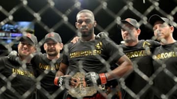Jan 3, 2015; Las Vegas, NV, USA; Jon Jones with his corner after defeating Daniel Cormier (not pictured) in their light heavyweight title fight at UFC 182 at the MGM Grand Garden Arena. Jones won. Mandatory Credit: Jayne Kamin-Oncea-USA TODAY Sports