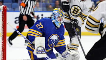 Sep 26, 2023; Buffalo, New York, USA; Buffalo Sabres goaltender Devon Levi (27) looks for the puck during the first period against the Boston Bruins at KeyBank Center. Mandatory Credit: Timothy T. Ludwig-USA TODAY Sports