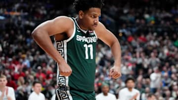 Mar 19, 2023; Columbus, Ohio, USA; Michigan State Spartans guard A.J. Hoggard (11) celebrates making a shot during the second round of the NCAA men’s basketball tournament against the Marquette Golden Eagles at Nationwide Arena. Mandatory Credit: Adam Cairns-The Columbus DispatchBasketball Ncaa Men S Basketball Tournament Round 2