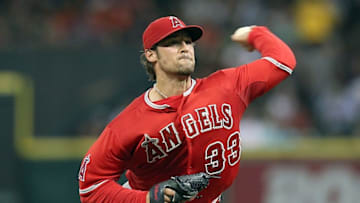 Jul 28, 2015; Houston, TX, USA; Los Angeles Angels starting pitcher C.J. Wilson (33) pitches against the Houston Astros in the fifth inning at Minute Maid Park. Astros won 10-5. Mandatory Credit: Thomas B. Shea-USA TODAY Sports