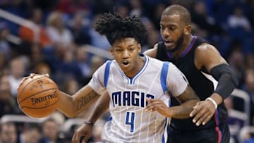Feb 5, 2016; Orlando, FL, USA; Orlando Magic guard Elfrid Payton (4) drives past Los Angeles Clippers guard Chris Paul during the second half of a basketball game at Amway Center. The Clippers won 107-93. Mandatory Credit: Reinhold Matay-USA TODAY Sports