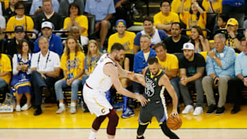 OAKLAND, CA - JUNE 03: Kevin Love #0 of the Cleveland Cavaliers defends against Stephen Curry #30 of the Golden State Warriors in Game 2 of the 2018 NBA Finals at ORACLE Arena on June 3, 2018 in Oakland, California. NOTE TO USER: User expressly acknowledges and agrees that, by downloading and or using this photograph, User is consenting to the terms and conditions of the Getty Images License Agreement. (Photo by Lachlan Cunningham/Getty Images)