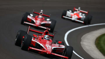 INDIANAPOLIS, IN - MAY 25: Dan Wheldon driver of #10 Target Chip Ganassi Racing Dallara Honda leads his teammate Scott Dixon and Helio Castroneves during the IRL IndyCar Series 92nd running of the Indianapolis 500 at the Indianapolis Motor Speedway on May 25, 2008 in Indianapolis, Indiana. (Photo by Robert Laberge/Getty Images)