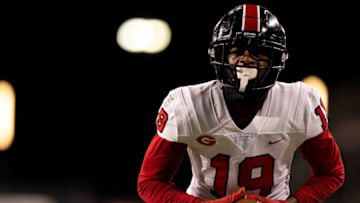Cleveland Glenville wide receiver Damarion Witten (19) scores a touchdown off a pass in the first quarter of the OHSAA DIV state championship game between at Tom Benson Hall of Fame Stadium in Canton, Ohio, on Saturday, Dec. 3, 2022.High School Football Wyoming Vs Cleveland Glenville In Ohsaa Div State Championship Game