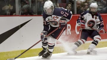 16 Jan 1998: Cammi Granato #21 of the USA controls the puck during USA''s 2-1 loss to Canada in the women''s hockey match at the 1998 NHL All-Star Weekend at General Motors Place in Vancouver, Canada. Mandatory Credit: Elsa Hasch /Allsport