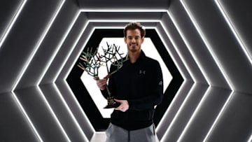PARIS, FRANCE - NOVEMBER 06: Andy Murray of Great Britain poses with 'Tree of Fanti' Trophy after winning the Mens Singles Final against John Isner of the United States on day seven of the BNP Paribas Masters at Palais Omnisports de Bercy on November 6, 2016 in Paris, France. (Photo by Dan Mullan/Getty Images)
