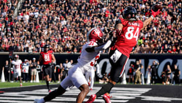 Auburn footballSep 24, 2022; Cincinnati, Ohio, USA; Cincinnati Bearcats wide receiver Nick Mardner (84) is unable to reach a pass in the end zone against Indiana Hoosiers defensive back Bryant Fitzgerald (31) in the second quarter at Nippert Stadium. Mandatory Credit: Kareem Elgazzar/Cincinnati Enquirer via USA TODAY NETWORK