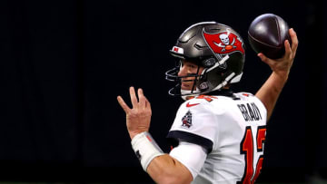 ATLANTA, GEORGIA - DECEMBER 20: Tom Brady #12 of the Tampa Bay Buccaneers looks to throw a pass against the Atlanta Falcons during the second quarter in the game at Mercedes-Benz Stadium on December 20, 2020 in Atlanta, Georgia. (Photo by Kevin C. Cox/Getty Images)