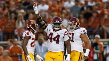 AUSTIN, TX - SEPTEMBER 15: Malik Dorton #44 of the USC Trojans celebrates after a tackle in the first quarter against the Texas Longhorns at Darrell K Royal-Texas Memorial Stadium on September 15, 2018 in Austin, Texas. (Photo by Tim Warner/Getty Images)