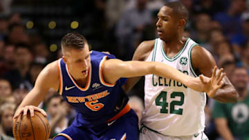 BOSTON, MA - OCTOBER 24: Al Horford #42 of the Boston Celtics defends Kristaps Porzingis #6 of the New York Knicks during the first half at TD Garden on October 24, 2017 in Boston, Massachusetts. (Photo by Maddie Meyer/Getty Images)