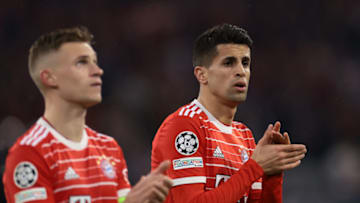 MUNICH, GERMANY - MARCH 08: Barcelona target Joao Cancelo and Joshua Kimmich of Bayern Munchen applaud the fans following the final whistle of the UEFA Champions League round of 16 leg two match between FC Bayern München and Paris Saint-Germain at Allianz Arena on March 08, 2023 in Munich, Germany. (Photo by Jonathan Moscrop/Getty Images)